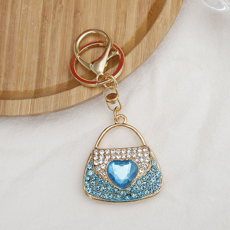 Wholesale Zinc Alloy Rhinestone Lipstick Perfume Bottle Keychain